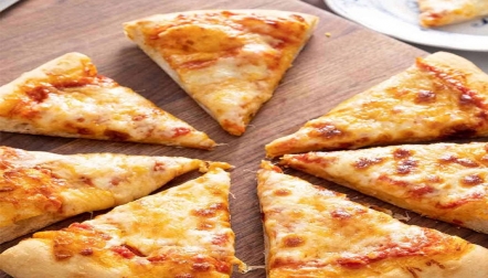 Cheezy Cheese Pizza by Forks N Knives